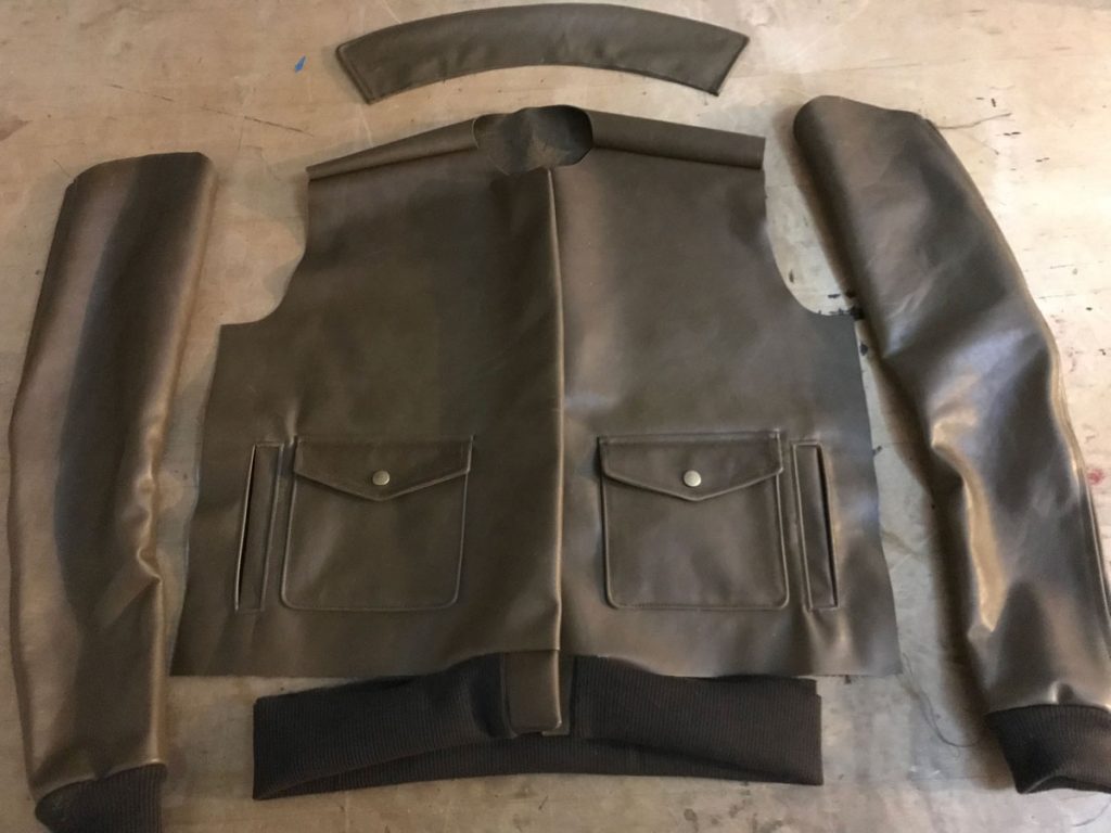 Partially assembled leather flight jacket