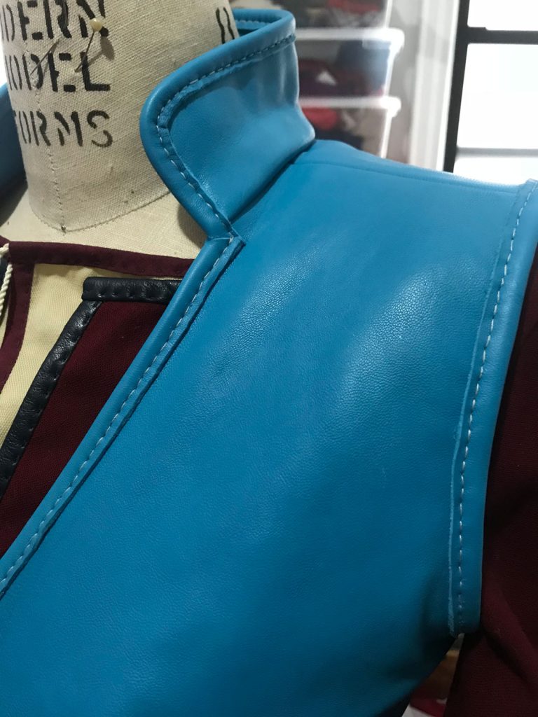 Detail of blue leather vest for ciri cosplay