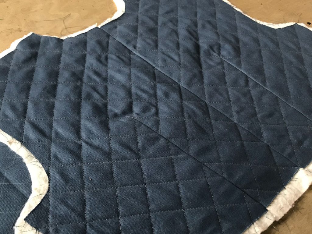 Quilted cotton twill lining for a vest back