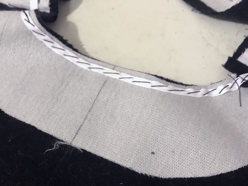interfacing and twill tape reinforcement for back of wool lining layer